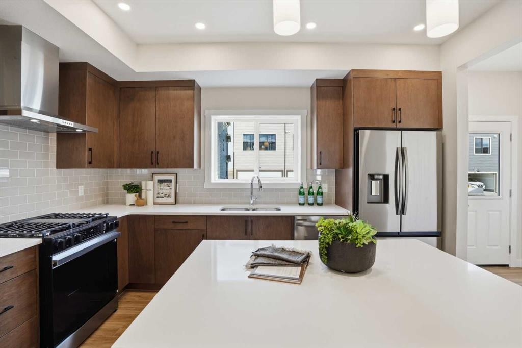 72 Buffaloberry Manor Se, Calgary, AB - Indoor Photo Showing Kitchen With Upgraded Kitchen