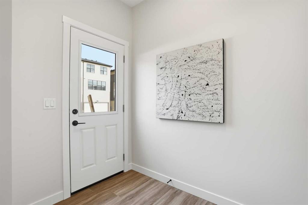 72 Buffaloberry Manor Se, Calgary, AB - Indoor Photo Showing Other Room