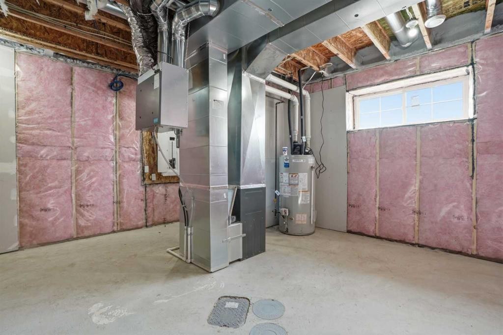 72 Buffaloberry Manor Se, Calgary, AB - Indoor Photo Showing Basement