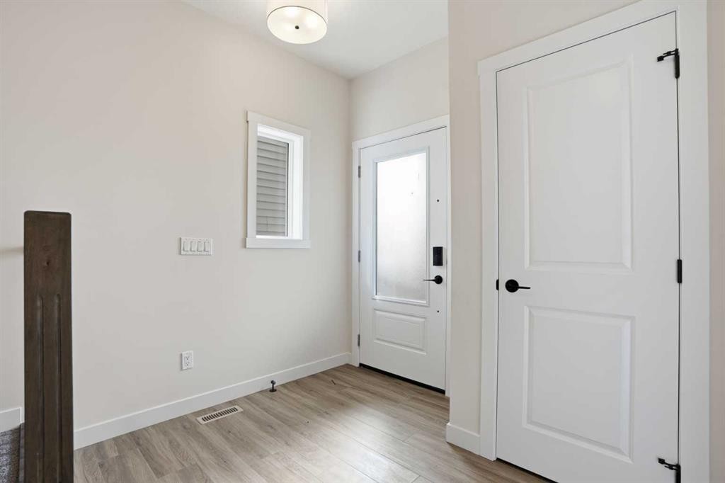 72 Buffaloberry Manor Se, Calgary, AB - Indoor Photo Showing Other Room