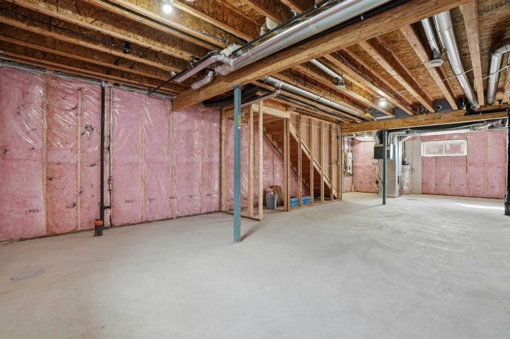 72 Buffaloberry Manor Se, Calgary, AB - Indoor Photo Showing Basement