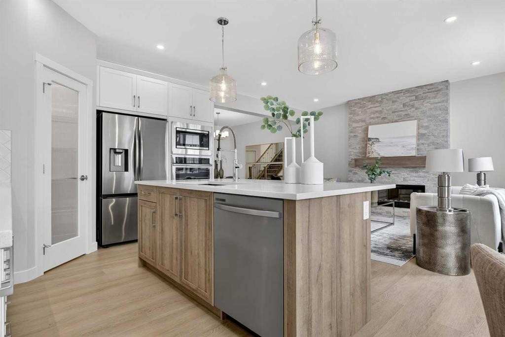 67 Versant Way Sw, Calgary, AB - Indoor Photo Showing Kitchen With Stainless Steel Kitchen With Upgraded Kitchen