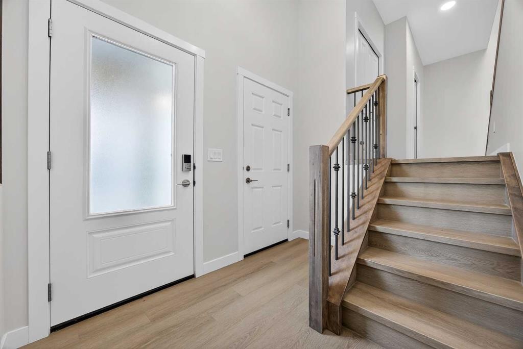 67 Versant Way Sw, Calgary, AB - Indoor Photo Showing Other Room