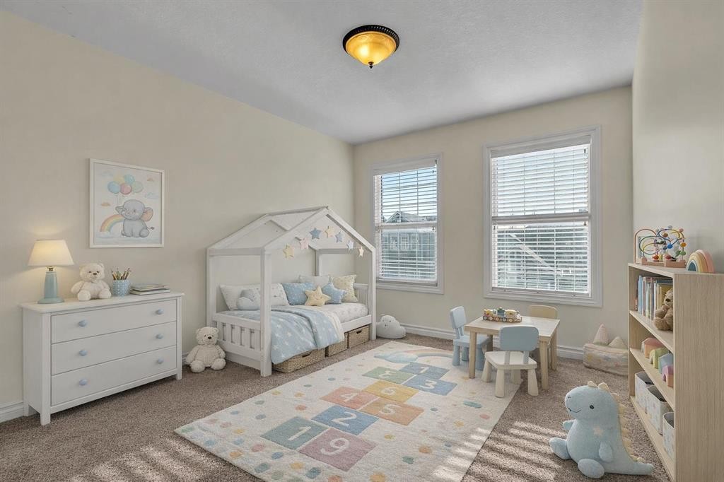 8 Legacy Terrace Se, Calgary, AB - Indoor Photo Showing Bedroom