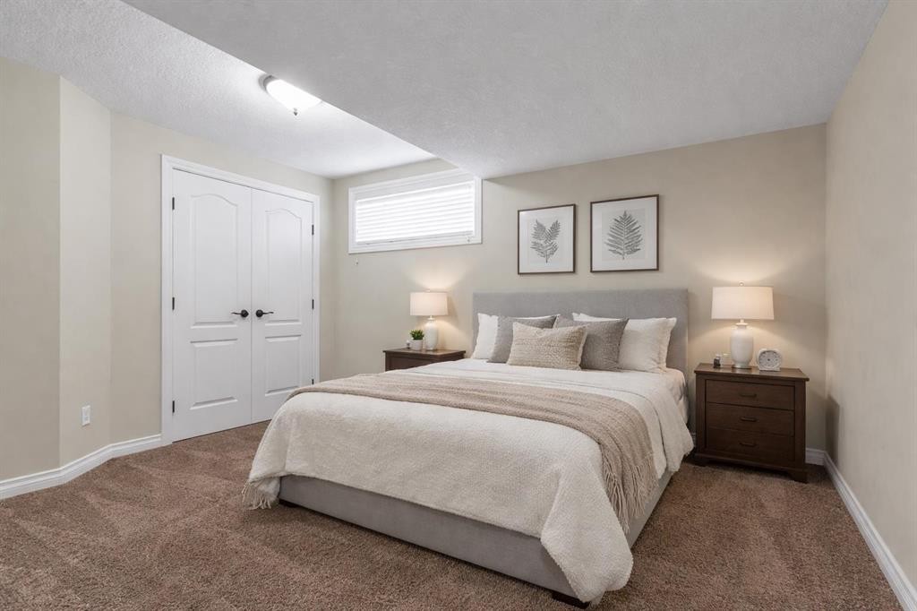 8 Legacy Terrace Se, Calgary, AB - Indoor Photo Showing Bedroom