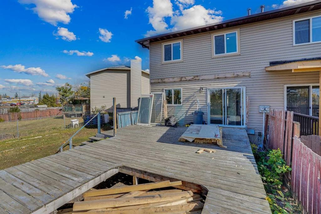 26 Falmead Bay Ne, Calgary, AB - Outdoor With Deck Patio Veranda With Exterior