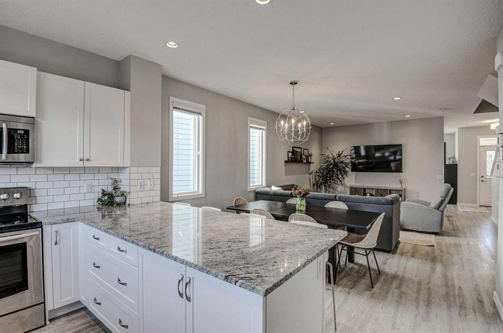 52 Masters Link Se, Calgary, AB - Indoor Photo Showing Kitchen With Upgraded Kitchen