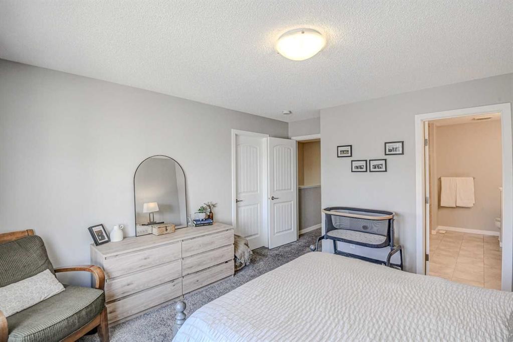 52 Masters Link Se, Calgary, AB - Indoor Photo Showing Bedroom