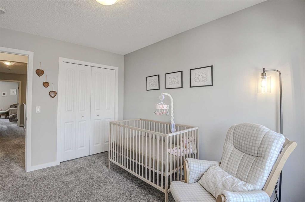 52 Masters Link Se, Calgary, AB - Indoor Photo Showing Bedroom