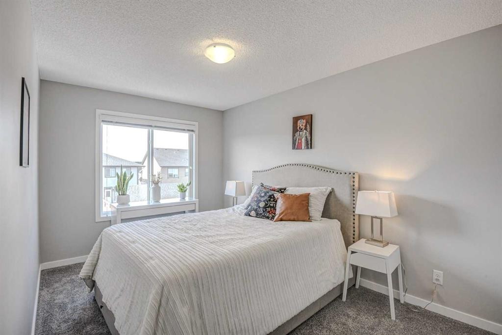 52 Masters Link Se, Calgary, AB - Indoor Photo Showing Bedroom