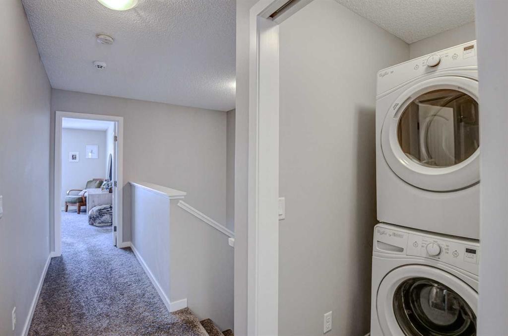 52 Masters Link Se, Calgary, AB - Indoor Photo Showing Laundry Room