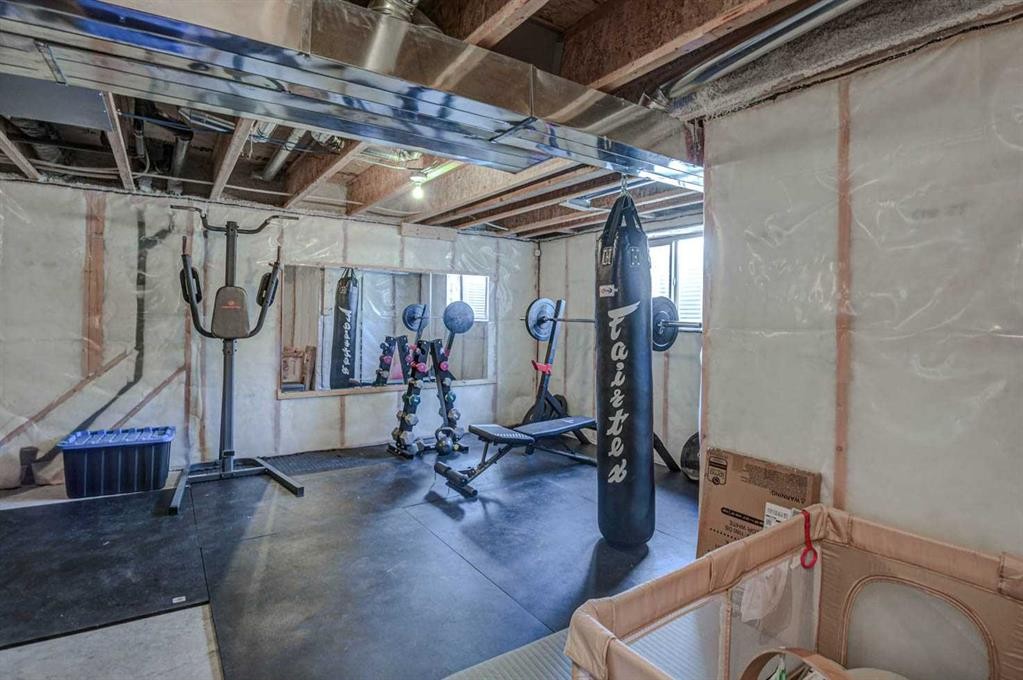 52 Masters Link Se, Calgary, AB - Indoor Photo Showing Basement