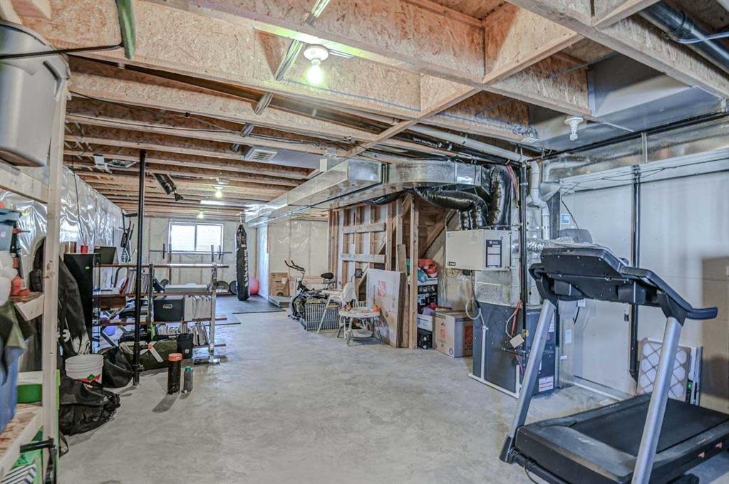 52 Masters Link Se, Calgary, AB - Indoor Photo Showing Gym Room