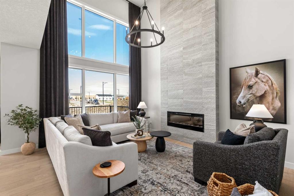 291 Rivercrest Way, Cochrane, AB - Indoor Photo Showing Living Room With Fireplace