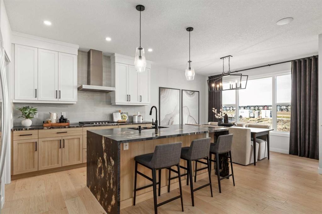 291 Rivercrest Way, Cochrane, AB - Indoor Photo Showing Kitchen With Upgraded Kitchen