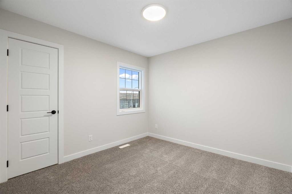 334 Rivercrest Road, Cochrane, AB - Indoor Photo Showing Other Room