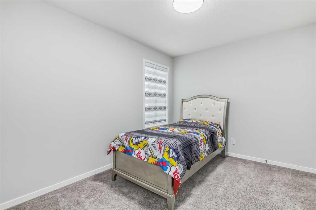 612 Seton Circle Se, Calgary, AB - Indoor Photo Showing Bedroom