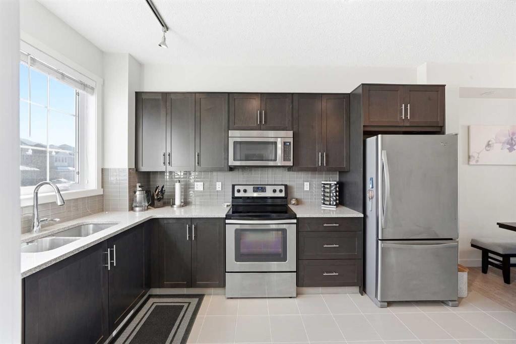 14 Nolan Hill Gate Nw, Calgary, AB - Indoor Photo Showing Kitchen With Stainless Steel Kitchen With Double Sink