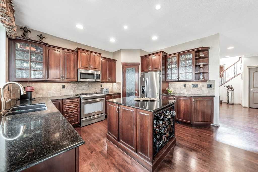 40 Cougar Ridge Heights Sw, Calgary, AB - Indoor Photo Showing Kitchen With Stainless Steel Kitchen With Double Sink