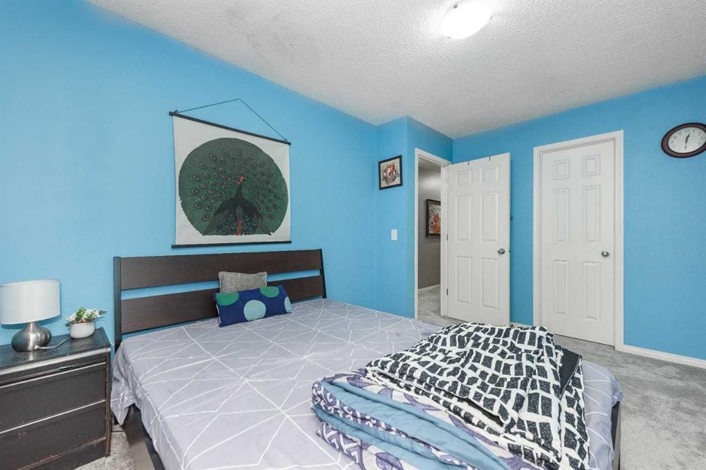 56 Evansbrooke Landing, Calgary, AB - Indoor Photo Showing Bedroom