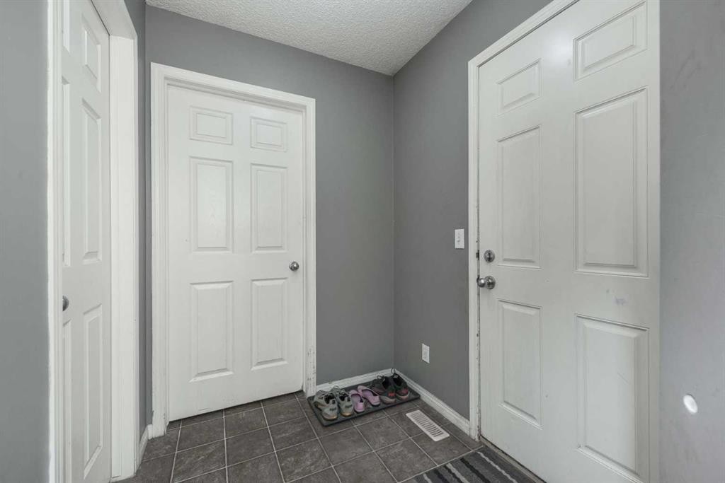 56 Evansbrooke Landing, Calgary, AB - Indoor Photo Showing Other Room
