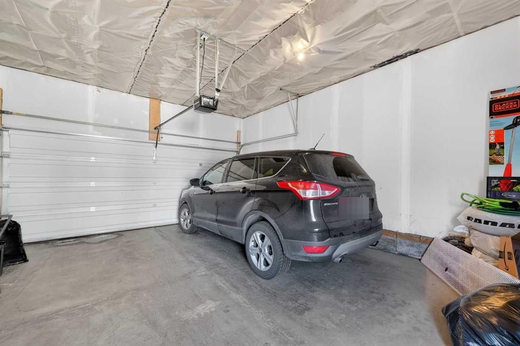 29 Skyview Parade Ne, Calgary, AB - Indoor Photo Showing Garage