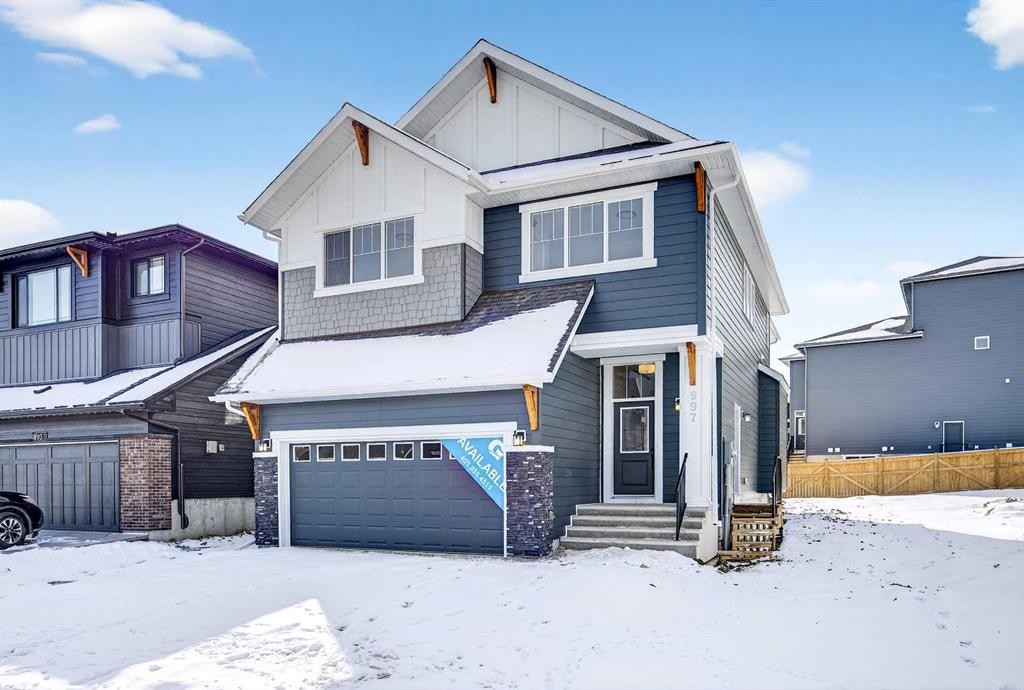 997 Alpine Drive Sw, Calgary, AB - Outdoor With Facade
