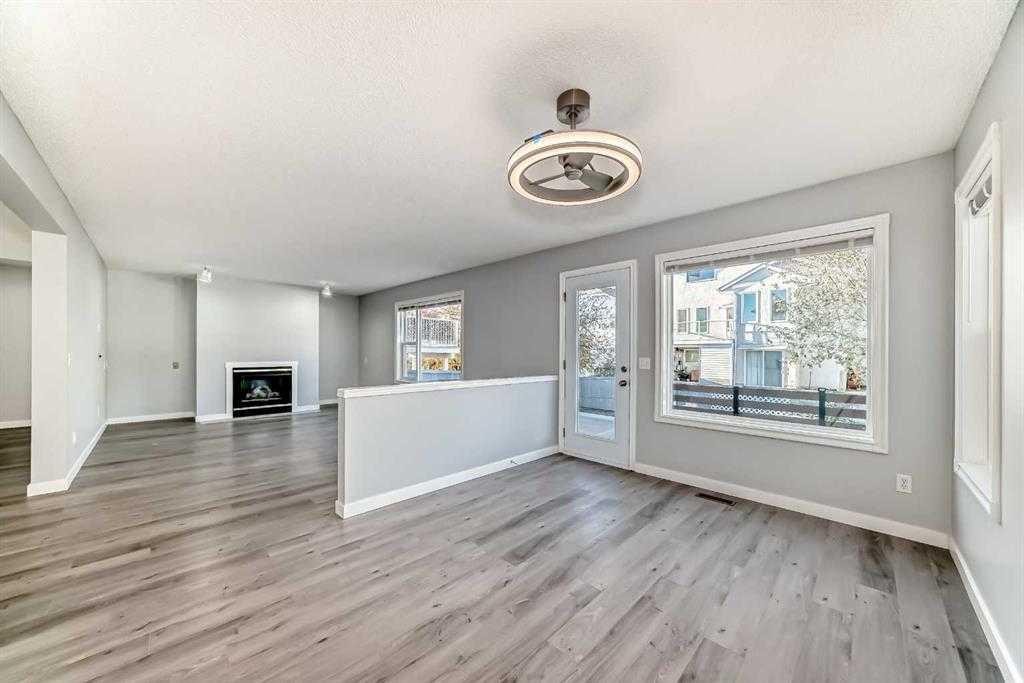 10134 Hidden Valley Drive Nw, Calgary, AB - Indoor With Fireplace