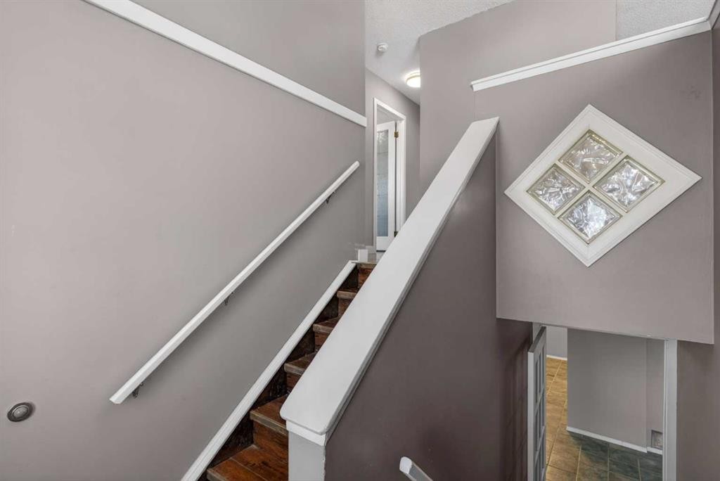 32 Fallingworth Court Ne, Calgary, AB - Indoor Photo Showing Other Room