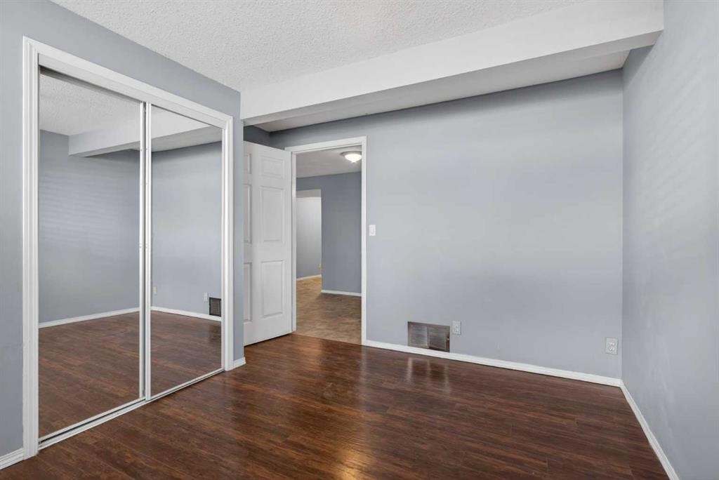 32 Fallingworth Court Ne, Calgary, AB - Indoor Photo Showing Other Room