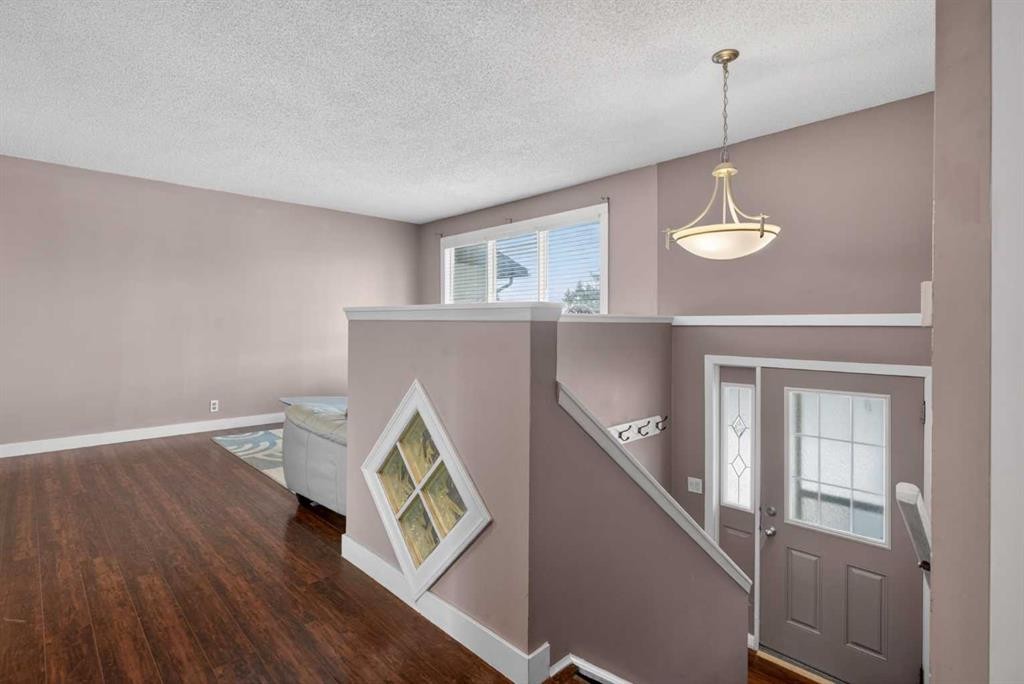 32 Fallingworth Court Ne, Calgary, AB - Indoor Photo Showing Other Room