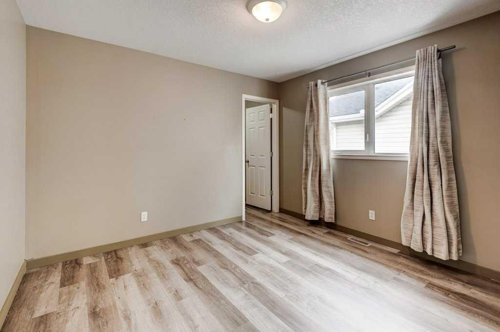 427 Copperfield Boulevard Se, Calgary, AB - Indoor Photo Showing Other Room