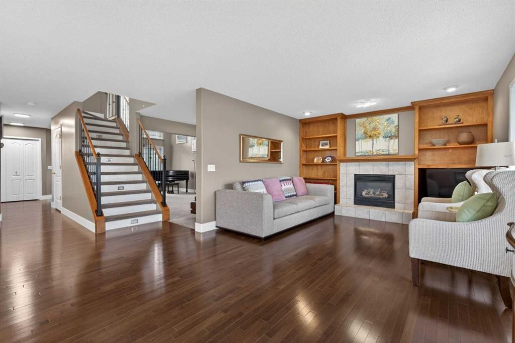 111 Valley Ponds Crescent Nw, Calgary, AB - Indoor Photo Showing Living Room With Fireplace
