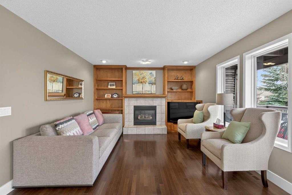 111 Valley Ponds Crescent Nw, Calgary, AB - Indoor Photo Showing Living Room With Fireplace