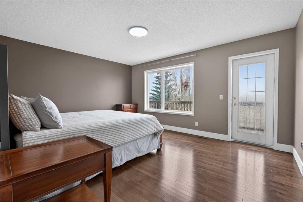 111 Valley Ponds Crescent Nw, Calgary, AB - Indoor Photo Showing Bedroom