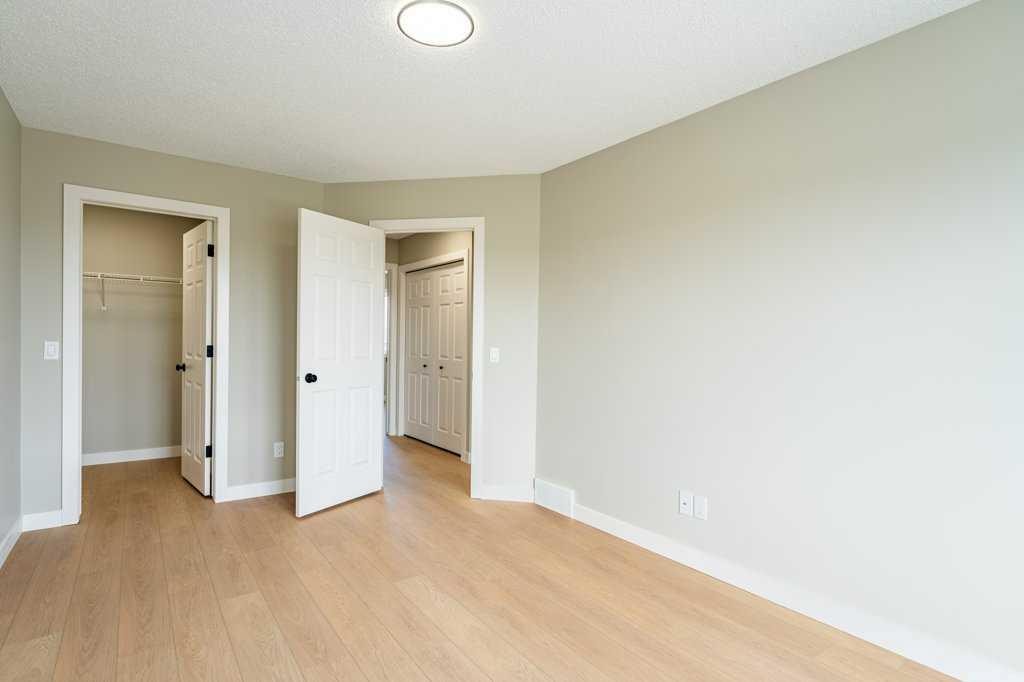 11 Saddlemont Close Ne, Calgary, AB - Indoor Photo Showing Other Room