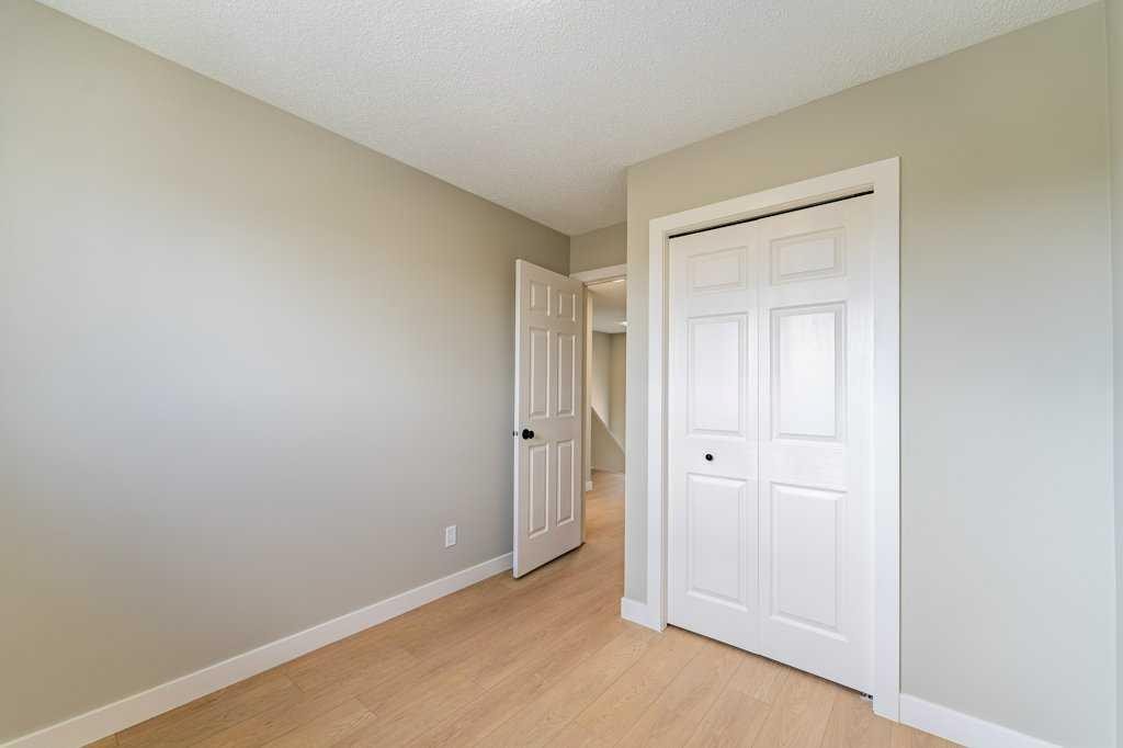 11 Saddlemont Close Ne, Calgary, AB - Indoor Photo Showing Other Room