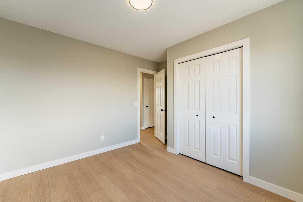 11 Saddlemont Close Ne, Calgary, AB - Indoor Photo Showing Other Room