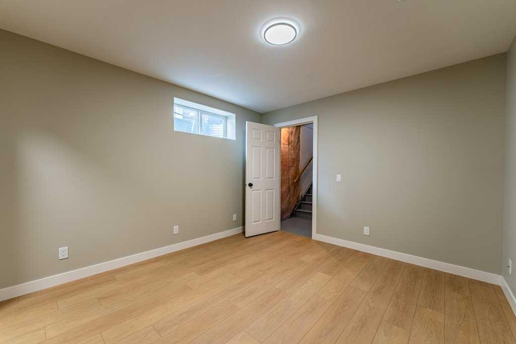 11 Saddlemont Close Ne, Calgary, AB - Indoor Photo Showing Other Room