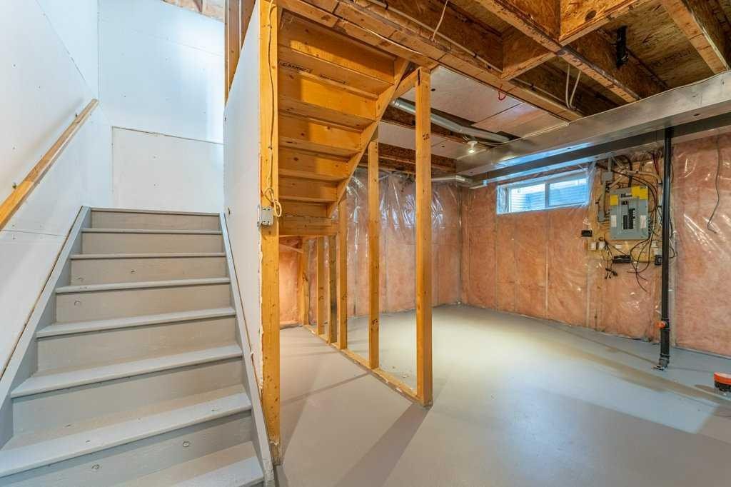 11 Saddlemont Close Ne, Calgary, AB - Indoor Photo Showing Basement