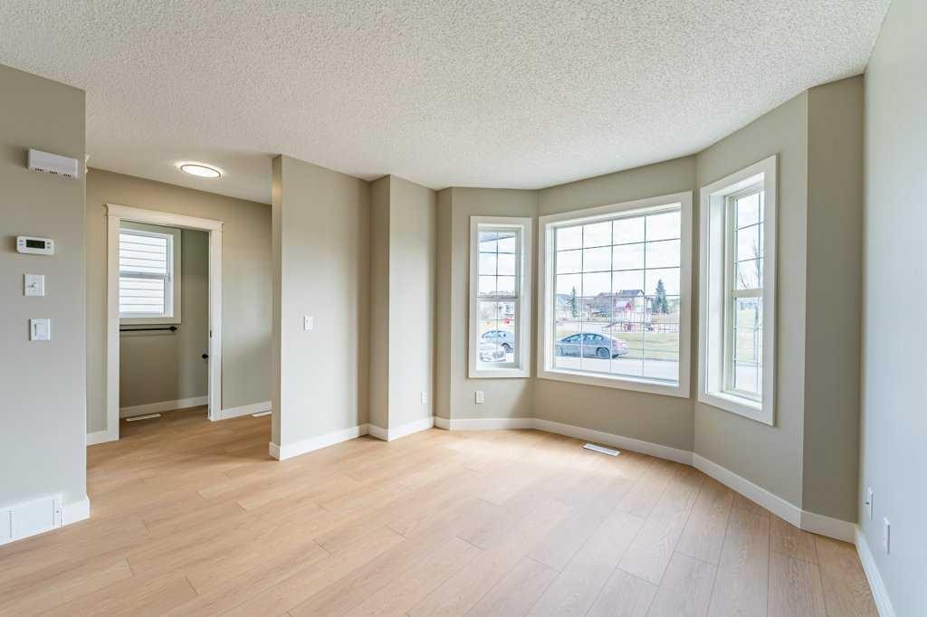 11 Saddlemont Close Ne, Calgary, AB - Indoor Photo Showing Other Room