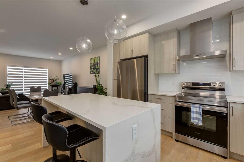 94-903 Mahogany Boulevard Se, Calgary, AB - Indoor Photo Showing Kitchen With Stainless Steel Kitchen