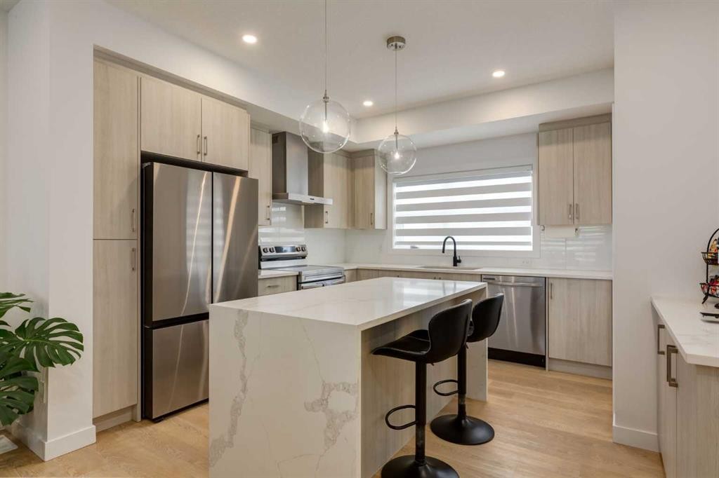 94-903 Mahogany Boulevard Se, Calgary, AB - Indoor Photo Showing Kitchen With Stainless Steel Kitchen With Upgraded Kitchen