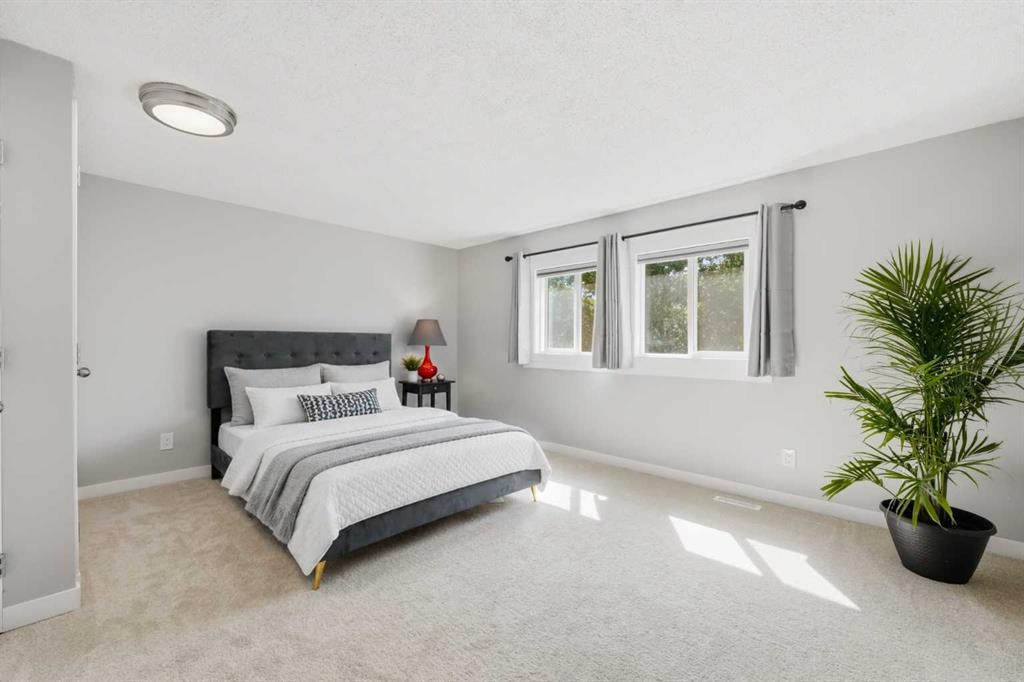 6 Mckernan Place Se, Calgary, AB - Indoor Photo Showing Bedroom