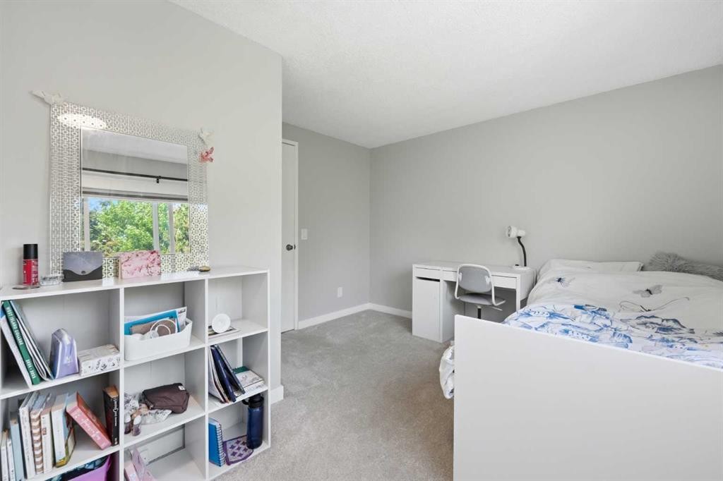 6 Mckernan Place Se, Calgary, AB - Indoor Photo Showing Bedroom