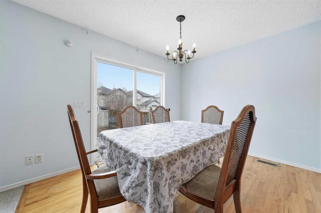62 New Brighton Circle Se, Calgary, AB - Indoor Photo Showing Dining Room