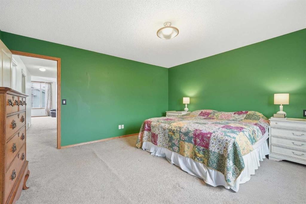 62 New Brighton Circle Se, Calgary, AB - Indoor Photo Showing Bedroom