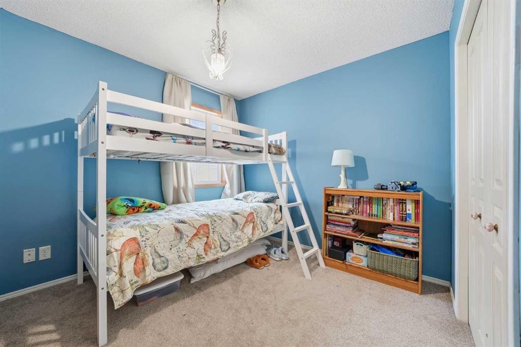 62 New Brighton Circle Se, Calgary, AB - Indoor Photo Showing Bedroom