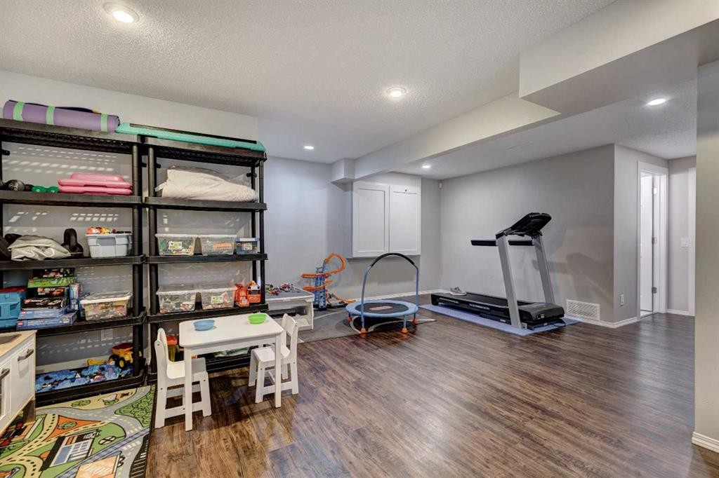 55 Legacy Crescent Se, Calgary, AB - Indoor Photo Showing Gym Room