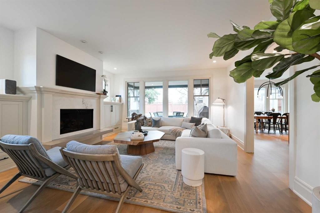 1903 48 Avenue Sw, Calgary, AB - Indoor Photo Showing Living Room With Fireplace